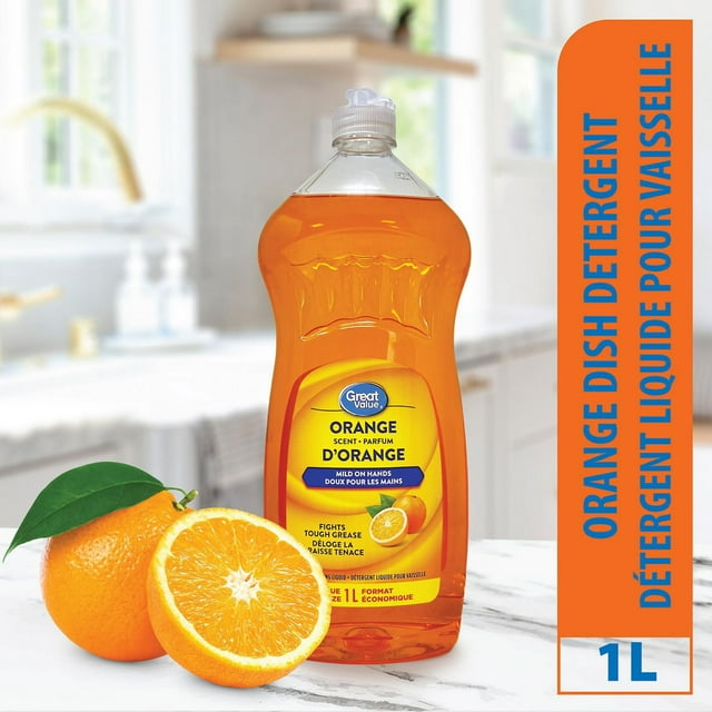 1-liter Great Value orange scented dish detergent bottle next to whole and halved fresh oranges on marble kitchen countertop