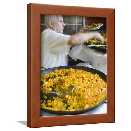 Man Serving Paella, with Noodle Paella in Foreground, Central, Valencia, Spain Framed Print Wall Art By Greg