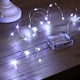 thumbnail image 1 of Cadena de luces LED a batería, 1 paquete de 100 mini luces de cadena de alambre de cobre con estrellas para dormitorio, Navidad, fiestas, bodas, centros de mesa, decoración (10 m/32,8 pies), 1 of 5