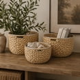 thumbnail image 3 of DecMode Tan, Wicker Natural Dried Plant, Coastal Serene Basket Set of 3 15", 17", 19"W, featuring Rattan Weave Design and Metal Ring Handle Accents, for Throw Blankets, Pillows, Living Room Storage, 3 of 11