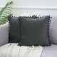 thumbnail image 1 of REGALWOVEN Pack de 2 fundas de almohada de terciopelo con pompones, fundas decorativas de almohada con flecos, color gris oscuro 18" x 18", 1 of 6
