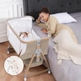 thumbnail image 1 of Cesta para bebé Jestonten junto a la cama con sábanas y colchón, 1 of 9