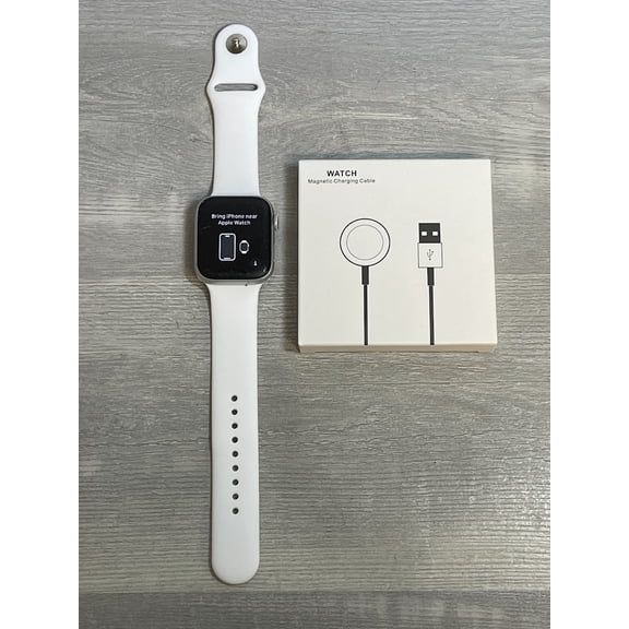 Pre-Owned Apple Watch SE GPS Cellular, 44mm Silver Aluminum Case with White Sport Band - Regular