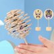 thumbnail image 2 of Wooden Spiral Lollipop Toys Rotating Spin Magic Wand Stress Relief for Adults Chinese Opera Face Yellow, 2 of 5