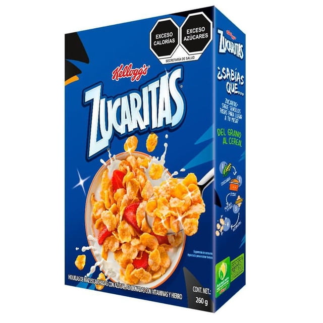 pack de 28 cereal kellogg´s zucaritas de 260g Caja 3/4 frontal con logotipo Kellogg's y nombre Zucaritas; fotografía de tazón con hojuelas de maíz escarchadas en leche, peso 260 g impreso, sellos de 'Exceso calorías' y 'Exceso azúcares' y texto lateral que menciona vitaminas del complejo B.