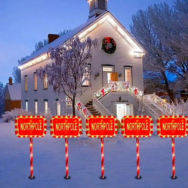Luces solares LED navideñas con forma de gorro navideño, luz solar cálida para jardín o patio. Decoración navideña para exteriores. Incluye cinco luces solares navideñas de plástico.