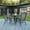 Gray, variant on BizChair 5 Piece Outdoor Patio Dining Set - 31.5" Square Tempered Glass Patio Table, 4 Black Flex Comfort Stack Chairs