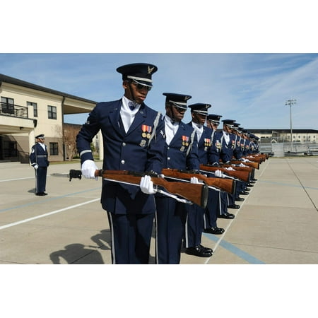 Team Practice Drills The United States Air Force Honor Guard Drill Team practices a new routine Poster Print by Stocktrek Images ()