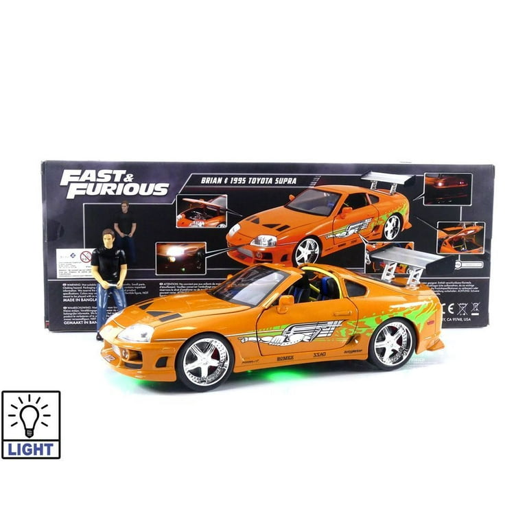 1995 Toyota Supra Orange Metallic with Lights and Brian Figurine