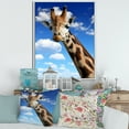 thumbnail image 2 of A Giraffe On A Blue Sky Portrait 16 in x 32 in Framed Photography Canvas Art Print, by Designart, 2 of 5