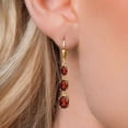 thumbnail image 3 of Gem Stone King 18K Yellow Gold Plated Silver Red Garnet 3 Stone Dangle Earrings for Women (6.14 Cttw, Gemstone January Birthstone, Oval 8X6MM, 7X5MM and 6X4MM), 3 of 6
