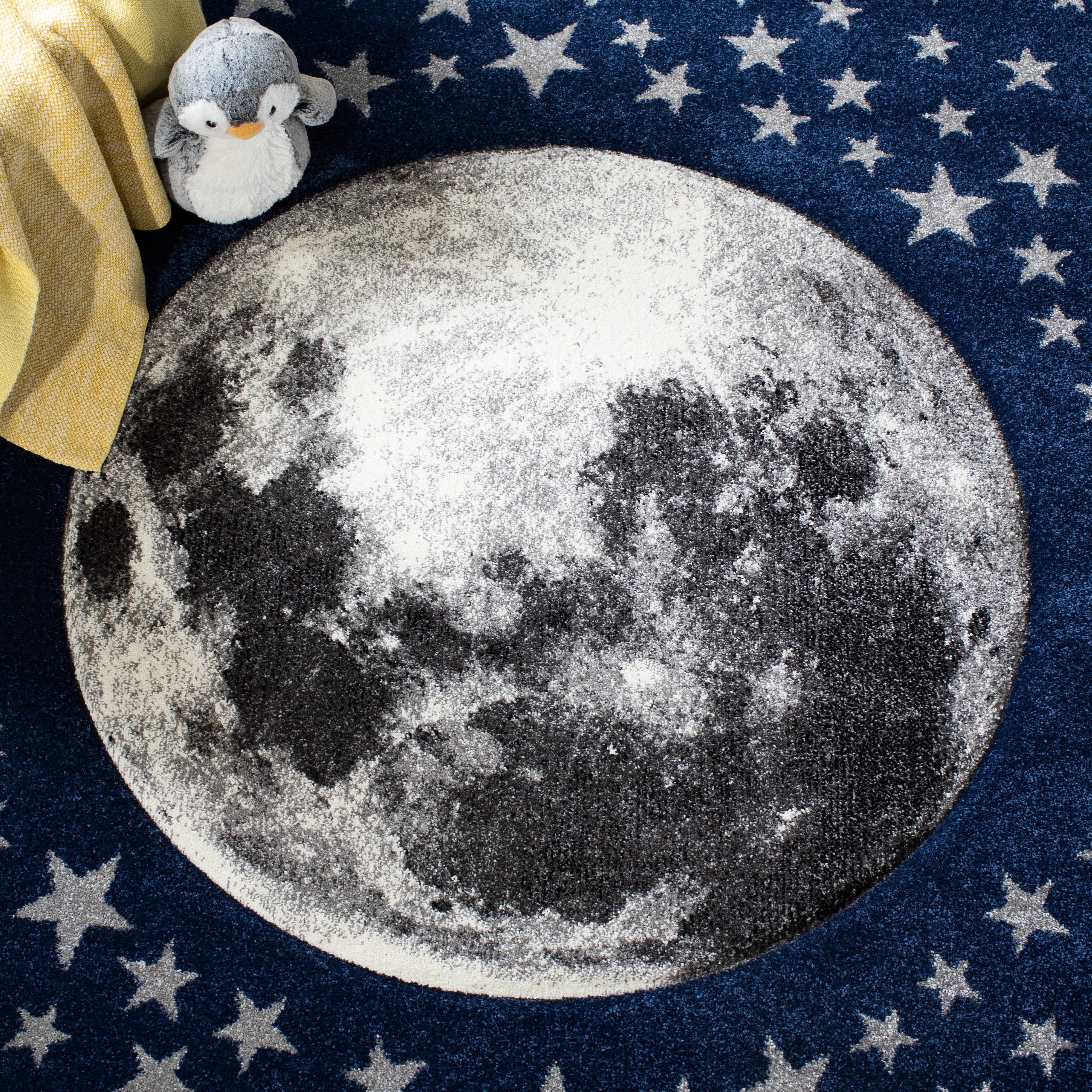 SAFAVIEH Carousel Kids Moon in the Stars Area Rug, Navy/Gray, 3' x 3' Round