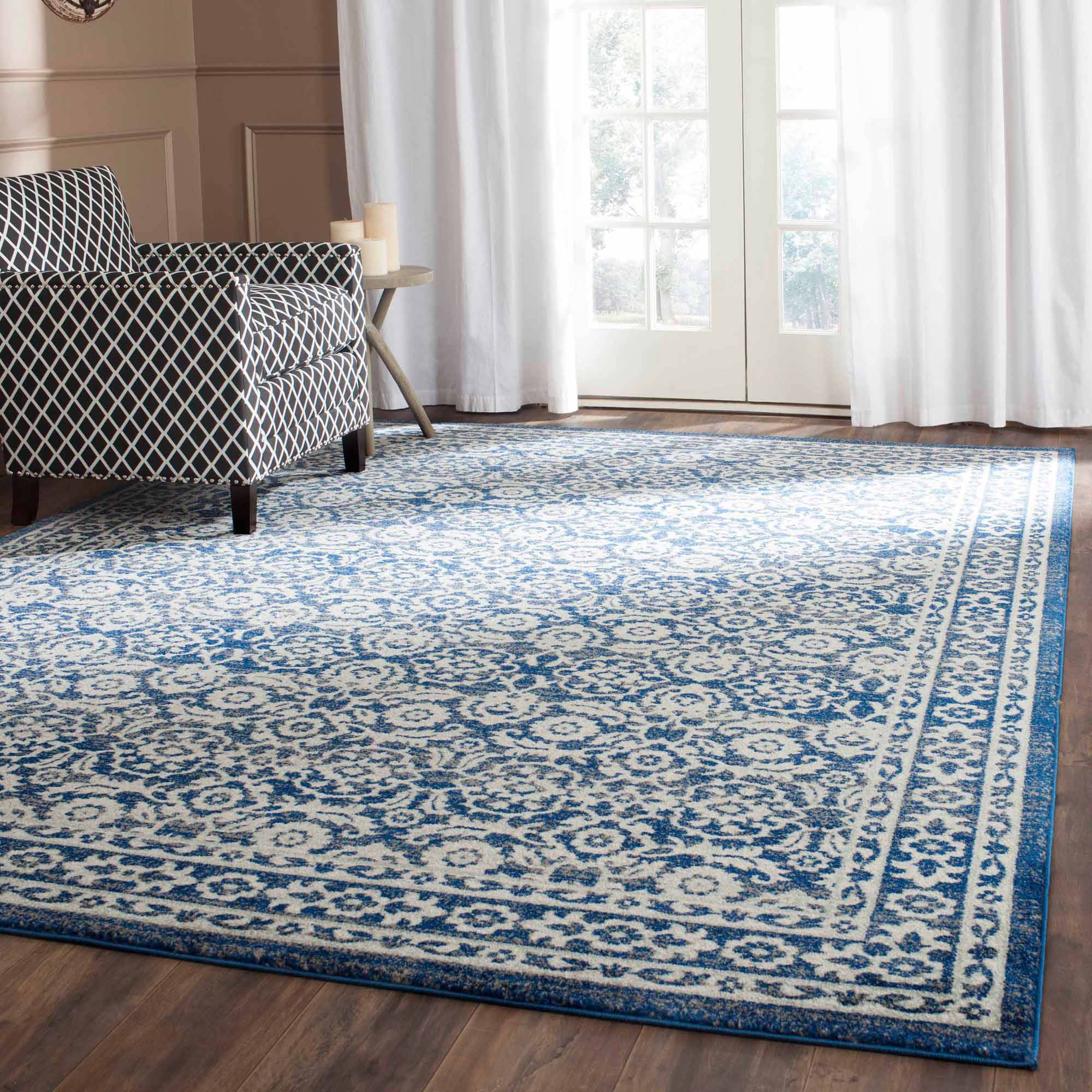 Power Loomed Area Rug in Royal and Ivory (7 ft. 6 in. L x 5 ft. 1 in. W