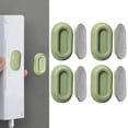 thumbnail image 1 of Soporte para mando a distancia de 4 piezas, montado en la pared, fácil de instalar, resistente, autoadhesivo, estante para mando a distancia de TV Verde, 1 of 8