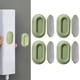 thumbnail image 1 of Soporte para mando a distancia de 4 piezas, montado en la pared, fácil de instalar, resistente, autoadhesivo, estante para mando a distancia de TV Verde, 1 of 8