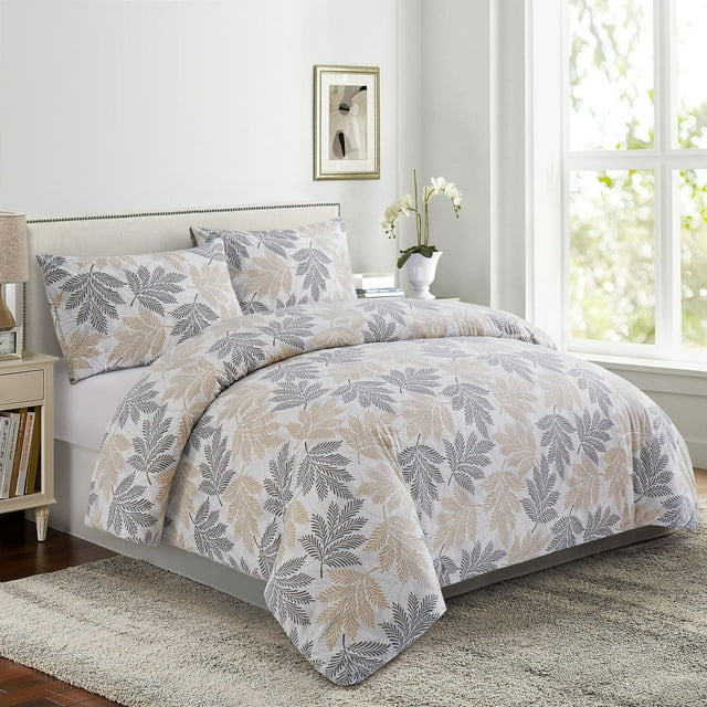 Ultra soft silky rayon from bamboo duvet cover set with taupe grey leaf print, including pillowcases, displayed on a bed in natural light.