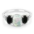 thumbnail image 2 of Gem Stone King 10K White Gold Cabochon White Simulated Opal Black Onyx and Diamond Accent Three-Stone Engagement Ring for Women 1.88 Cttw (Size 7), 2 of 4