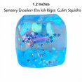 thumbnail image 2 of Blue Cube Squeeze Toy with Ocean Theme and Glitter Stars, 1.2 Inches, Sensory Squeeze Toy for Kids and Adults, Relaxation Squeeze Cube Squishy, 2 of 3
