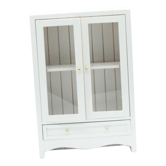 lionlar 12th Dollhouse Mini Display Cabinet Bookshelf Bookcase Living Room Accessory. A 1:12 scale white wooden miniature cabinet with double glass doors, a lower drawer, and gold-tone knobs. Suitable for dollhouse living rooms, kitchens, or bedrooms. Approximate dimensions: 10 x 3.5 x 14.5 cm (3.94 x 1.38 x 5.71 inches).