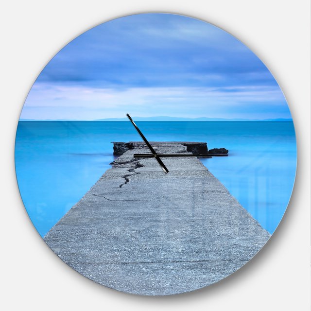 Designart 'Broken Concrete Jetty ' Modern wall clock