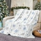 thumbnail image 4 of Manta navideña con copos de nieve azules y estampado blanco, suave y cálida, ideal para sofá cama, camping y festivales., 4 of 6