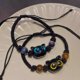 thumbnail image 4 of Pulsera de cuerda trenzada ajustable para hombre y mujer, brazalete con dije de gato negro, cadena de muñeca, regalo para pareja, joyería de moda, 4 of 5