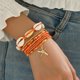 thumbnail image 1 of Pulsera tejida con cuentas de arroz blanco hecha a mano con cordón azul de concha y tortuga tejida para mujer, 1 of 6