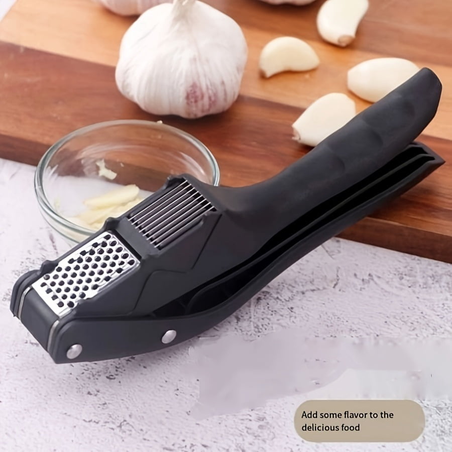 Stainless steel two-in-one garlic press is a must-have garlic slicing tool in the kitchen. It is durable and easy to clean. It is suitable for families and professional chefs.