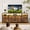 Brown, variant on GUNAITO TV Stand for TVs up to 75", Big TV Stand with 12 Fabric Drawers and LED Lights, Entertainment Center with Storage and Shelves for Living Room, Black