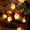 As shown, variant on Seyotauo Christmas Santa Claus String Lights, 5 Ft Christmas Decorations String Lights with 10 Santa Claus, Plug in Waterproof Novelty Fairy Light for Indoor Home Xmas Tree Winter Party Decor