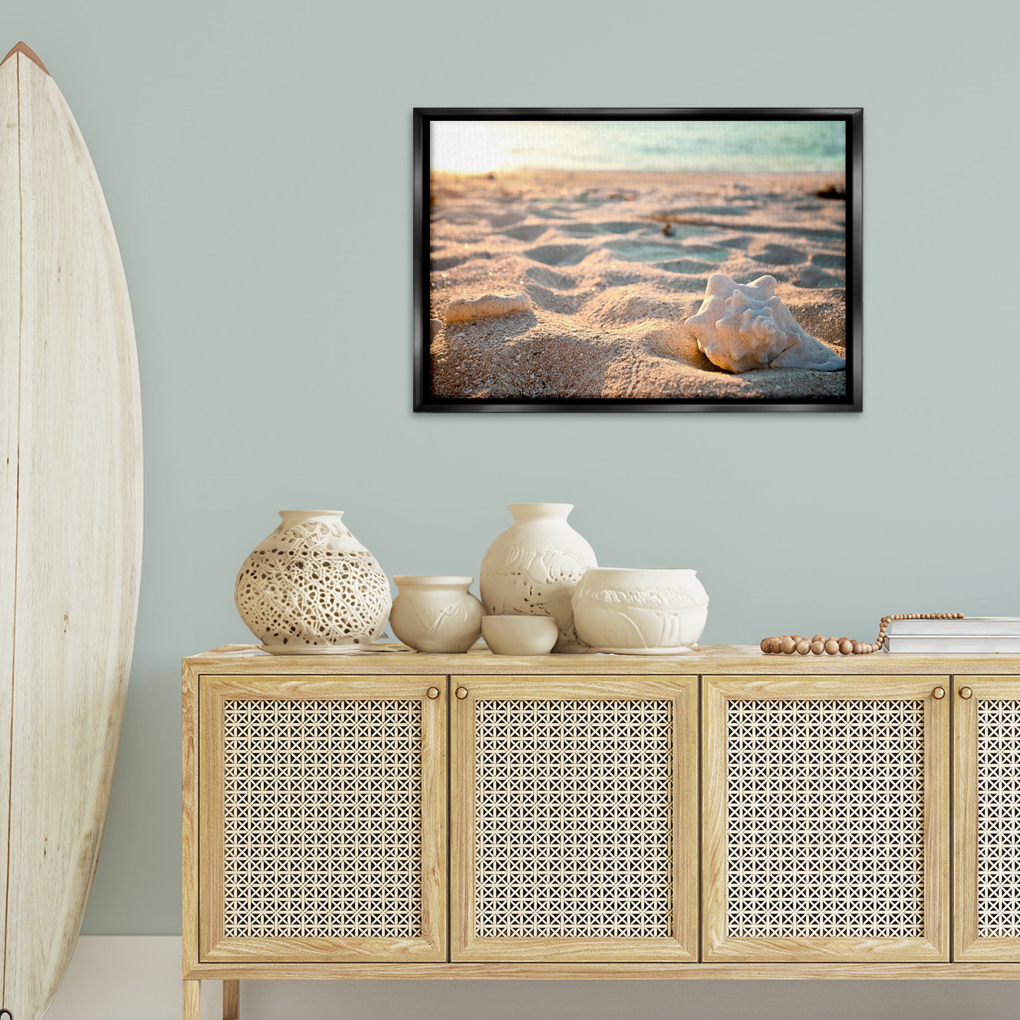Stupell Industries Conch Shell in Sand Coastal Photography Black Floater Framed Canvas Art Print Wall Art, 31 x 21