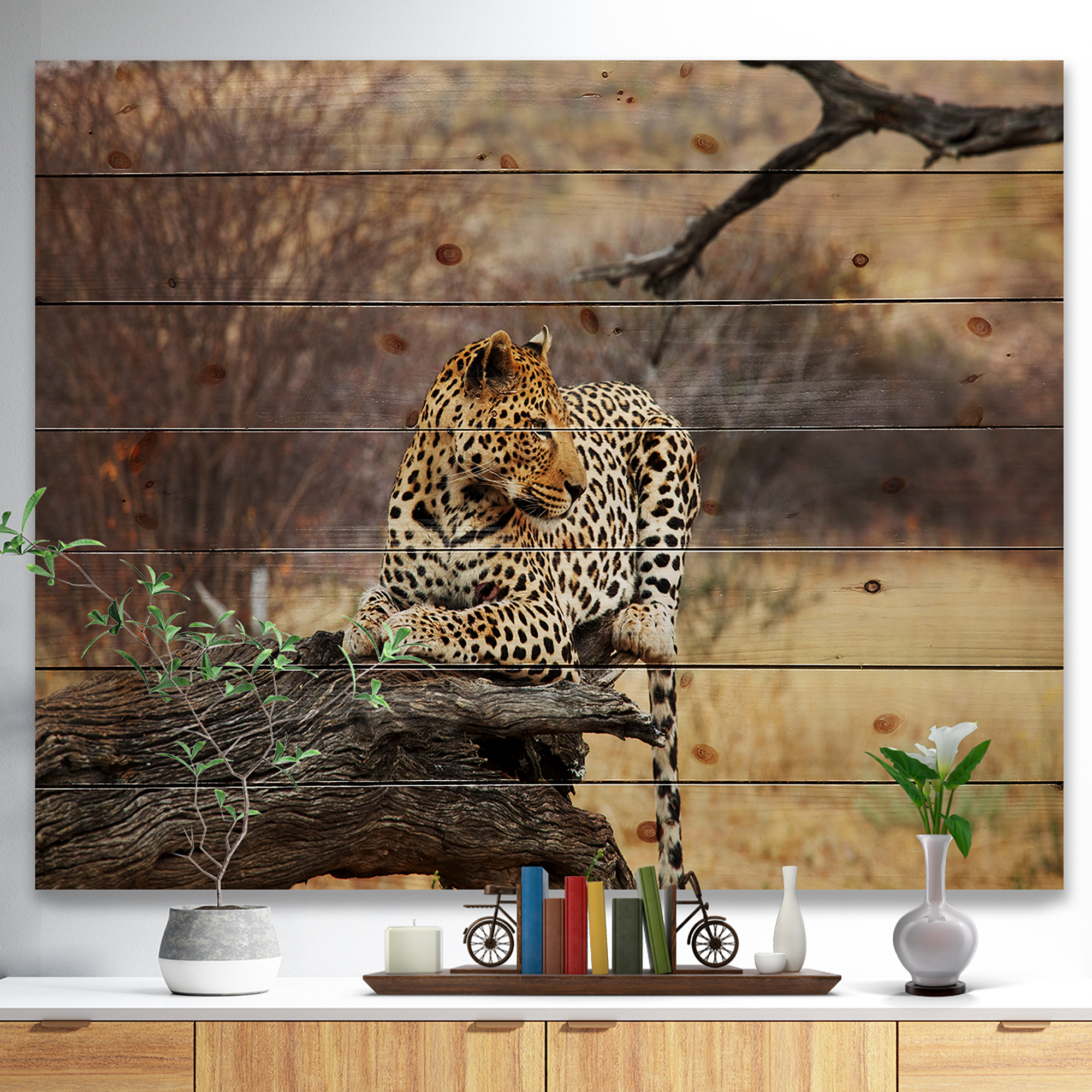 Designart 'Leopard Sitting on Tree Trunk' African Print on Natural Pine Wood