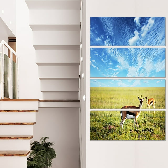 Antelopes Wandering under Bright Sky - African Canvas Art Print
