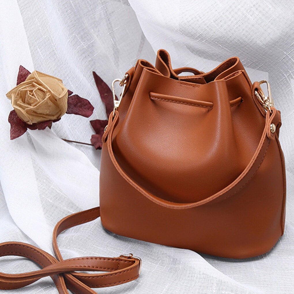 Designer Leather Tassel Bucket Bag For Women Vintage Shoulder Strap  Backpack Purse With Tote And Luxury Appeal From Junzhuang, $72.54