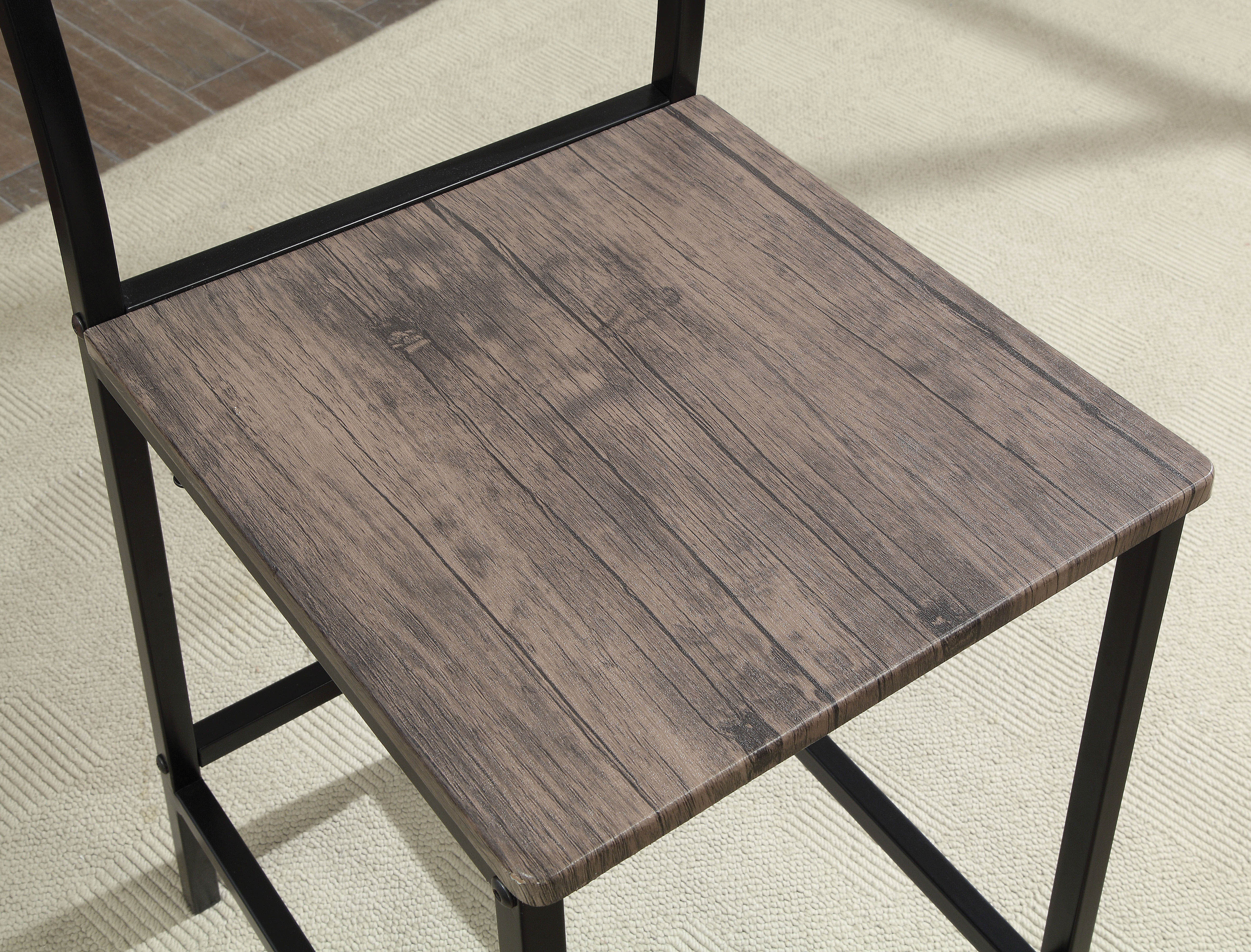 This Furniture of America Trujillo 5-Piece Rustic Farmhouse Counter Height Table Set, Black