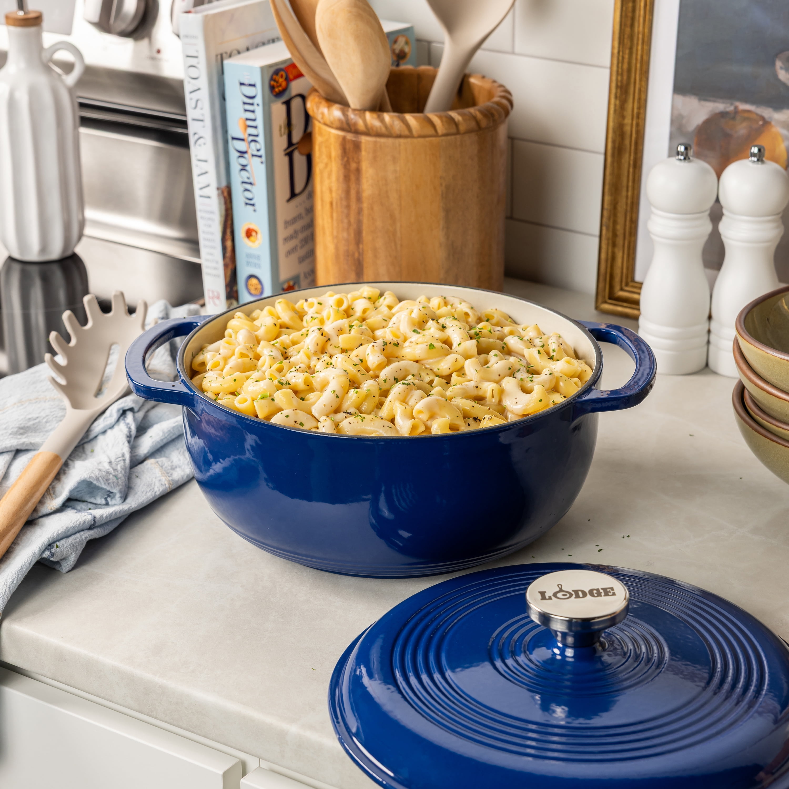 Lodge 4.5 Quart Enameled Cast Iron Dutch Oven with Lid – Dual Handles – Oven Safe up to 500° F or on Stovetop - Use to Marinate, Cook, Bake, Refrigerate and Serve – Indigo