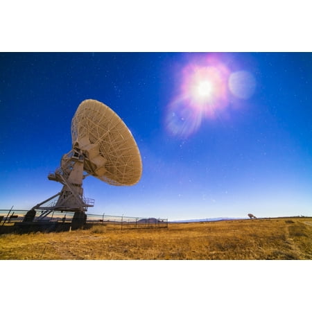 - The Very Large Array radio telescope under moonlight in New Mexico Poster Print