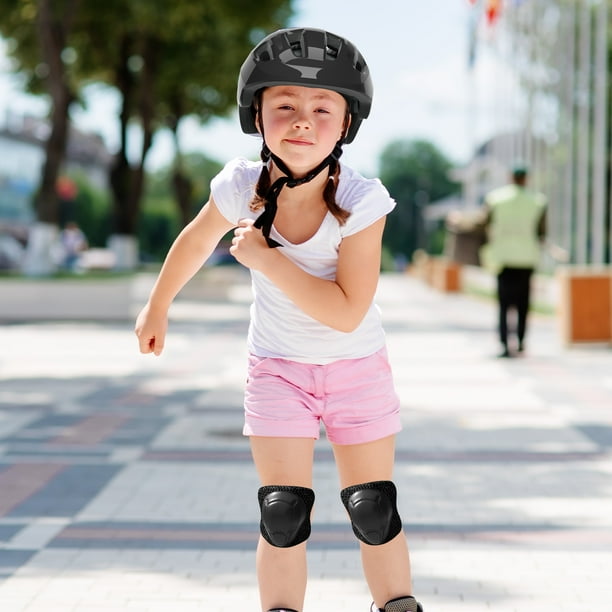 a girl and her bike helmet Melon Kids Bicycle Urban Active Unicorn Melon World GmbH Fun and multitudinous leopard spot emojis on a matte black base gives this bike helmet a subtle and fashion Ride Along Dolly Bike Helmet