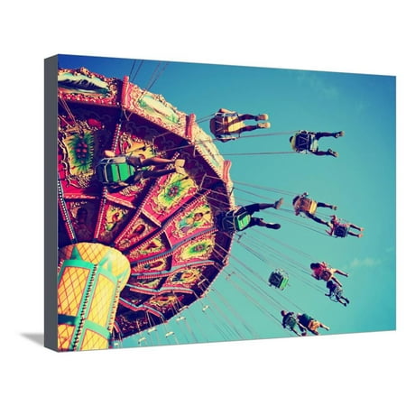 A Swinging Fair Ride at Dusk Toned with a Retro Vintage Instagram Filter App or Action Stretched Canvas Print Wall Art By Annette (Best App For Swinging)