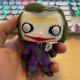 thumbnail image 1 of Figura de acción Warner Bros Joker de 10 cm, versión remasterizada en PVC, 1 of 2