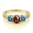 thumbnail image 2 of Gem Stone King 18K Yellow Gold Plated Silver 3-Stone Ring Oval/Checkerboard Red Garnet and Vivid Persian Blue Moissanite (2.12 Cttw, Size 6), 2 of 4