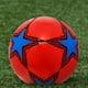 thumbnail image 2 of Balón de fútbol competitivo Advancent con cubierta luminosa de PU y vejiga de goma rojo, 2 of 6