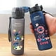 thumbnail image 5 of Botella de agua Lilo & Stitch de 560/600/400 ml para niños, portátil, de plástico transparente, con pajita, para exteriores, gran capacidad, para deportes, L-4, 5 of 6