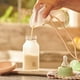 thumbnail image 3 of Extractor de leche Munchkin manual portátil de silicona de 120 ml, 3 of 7