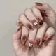 thumbnail image 1 of Uñas postizas cortas y medianas con 24 tabletas de uñas postizas con estampado. Destaca entre la multitud. Set de uñas adhesivas para mujer. Pegamento para uñas postizas de 1 ml., 1 of 8