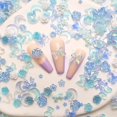 thumbnail image 1 of 100 Piezas Dijes de Uñas Azules Dijes de Uñas de Flores Dijes de Uñas de Corazón Formas Mixtas Resina de Uñas Oso Arco Mariposa Diseño de Estrella de Mar Conejo 3D Dijes de Uñas Florales para Manicura, 1 of 5