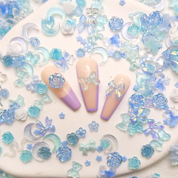 100 Piezas Dijes de Uñas Azules Dijes de Uñas de Flores Dijes de Uñas de Corazón Formas Mixtas Resina de Uñas Oso Arco Mariposa Diseño de Estrella de Mar Conejo 3D Dijes de Uñas Florales para Manicura