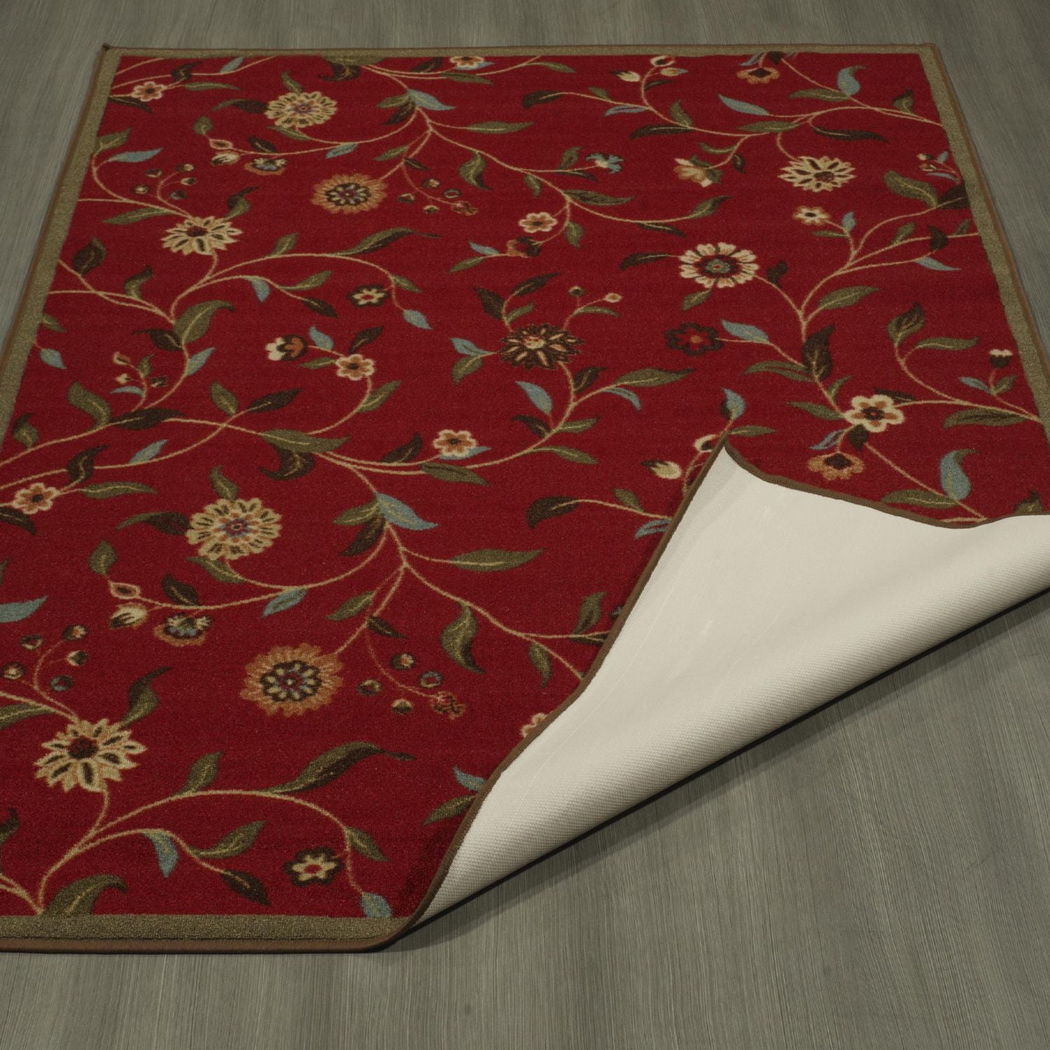 Tapis contemporain à motif de feuilles et à sous-couche en caoutchouc de la collection Ottohome