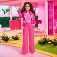 thumbnail image 3 of Barbie The Movie Doll, Gloria Collectible Wearing Three-Piece Pink Power Pantsuit with Strappy Heels and Golden Earrings, 3 of 7