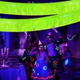thumbnail image 4 of Glow in The Dark Party Supplies, 4 Pack Foil Fringe Garland Birthday Party Decorations 9.8 ft Fluorescent Macaron Yellow Metallic Tinsel Streamers Banner, Glitter Photo Booth Prop Table Skir, 4 of 5